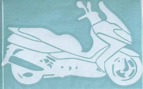 Samolepka motorkář na auto - skútr